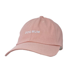Load image into Gallery viewer, Light pink baseball cap with white embroidered text that says "DOG MUM" across the front.
