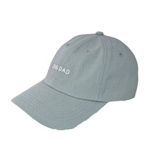 Load image into Gallery viewer, Light blue baseball cap with white embroidered text that says "DOG DAD" across the front.
